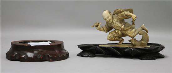 A Japanese ivory figure and two wood stands